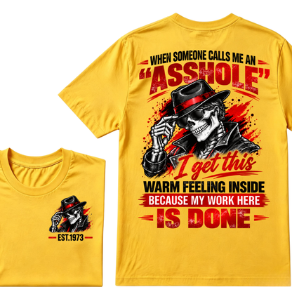 WHEN SOMEONE CALLS ME AN “ASSHOLE” I Get This Warm Feeling Inside EST.Year Fedora Skeleton Print T‑Shirt